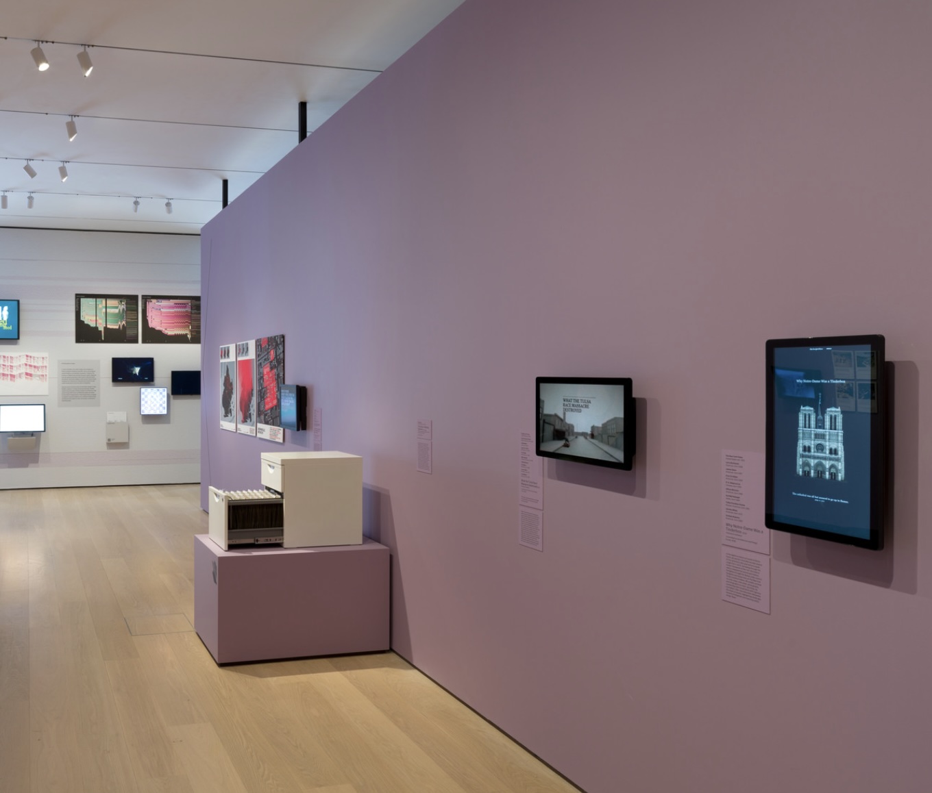 The Notre Dame reconstruction on a screen in a MoMA gallery.